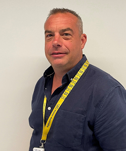 A headshot of Nigel Mapes