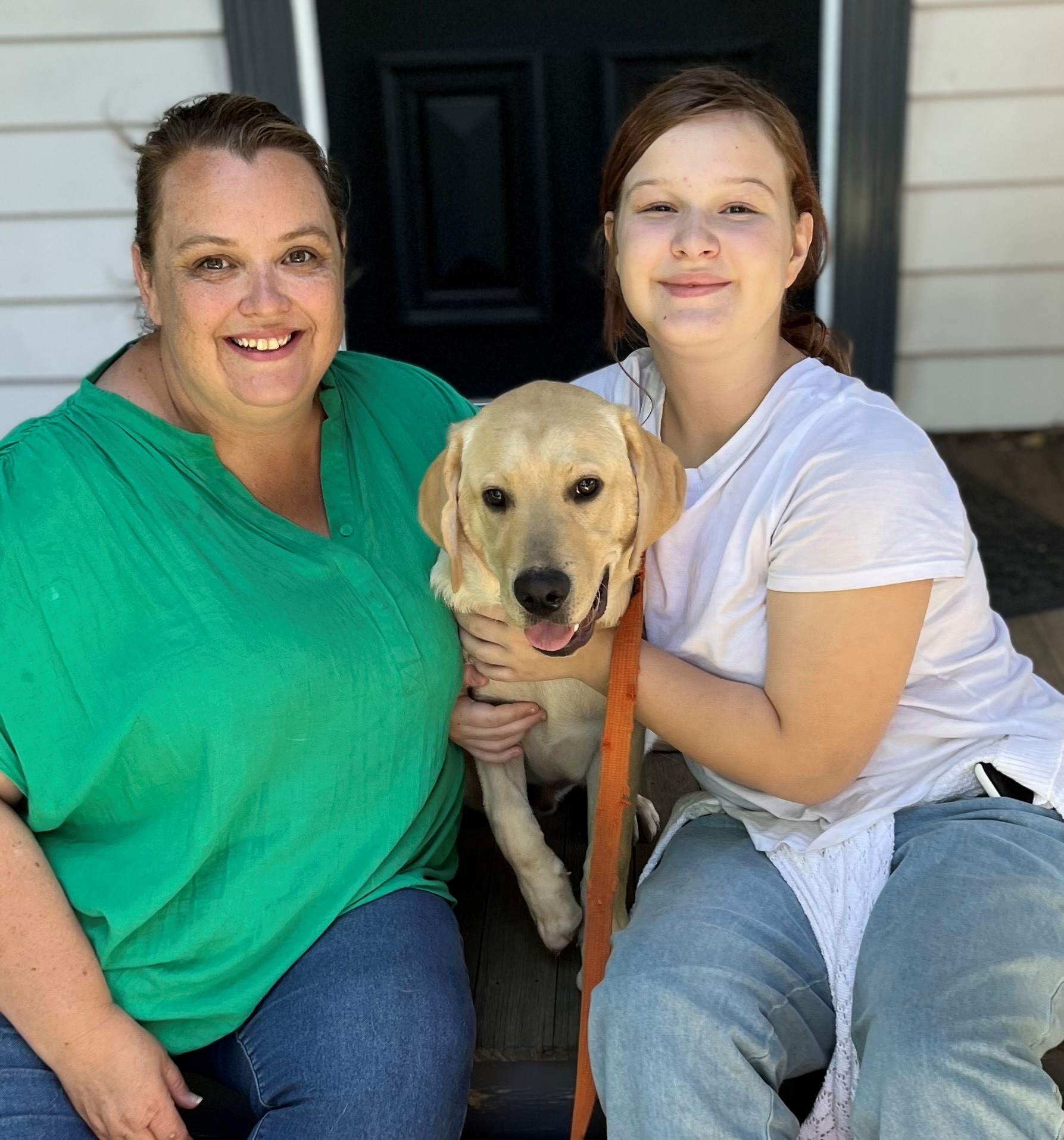 Puppy carer Sally and her daughter with Seeing Eye Dog in training Sergo