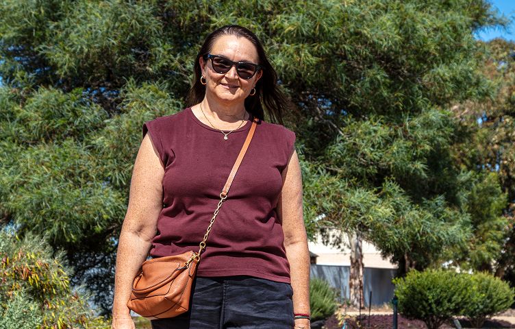 Tarina is wearing sunglasses and smiling