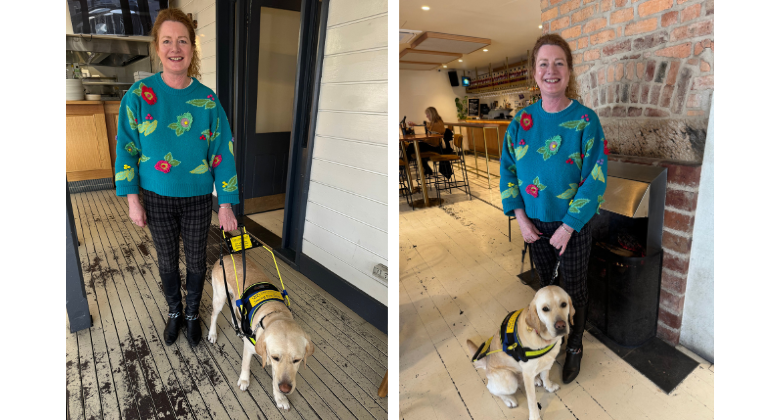 Angela, standing in a pub, next to her Seeing Eye Dog, Yuki.